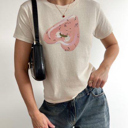 ‘CUTE AS A BUTTON’ pink detail baby tee