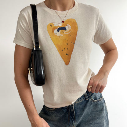 ‘CUTE AS A BUTTON’ yellow detail baby tee